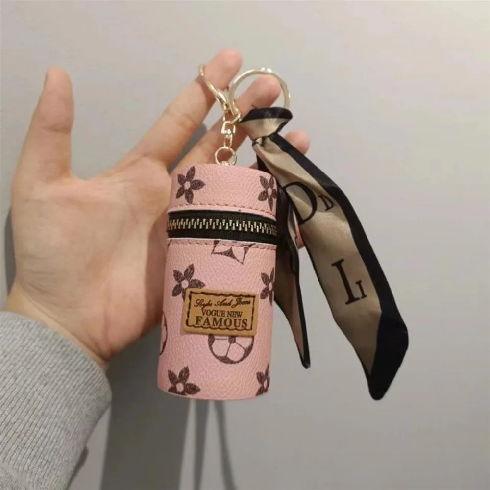 กระเป๋าใส่ลิปสติกทรงกระบอกพิมพ - Monogram Keychain Leather บทวิจารณ์และราคา